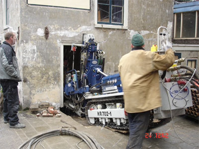 Machine door het raam 1