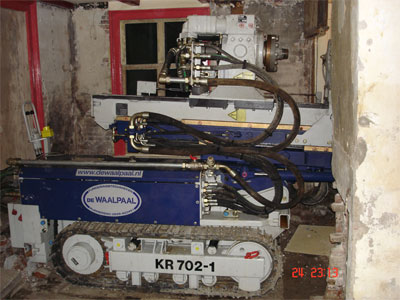 Machine ingeklemd in woonkamer